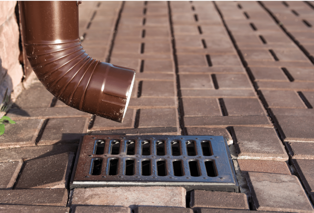 Hardscape Drainage Ideas for Chicago: Catch Basin at Downspout
